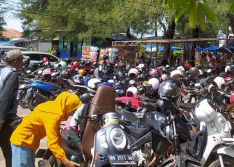 Warning Para Jukir, Naikkan Tarif Parkir saat Nataru Terancam Pencabutan SPT